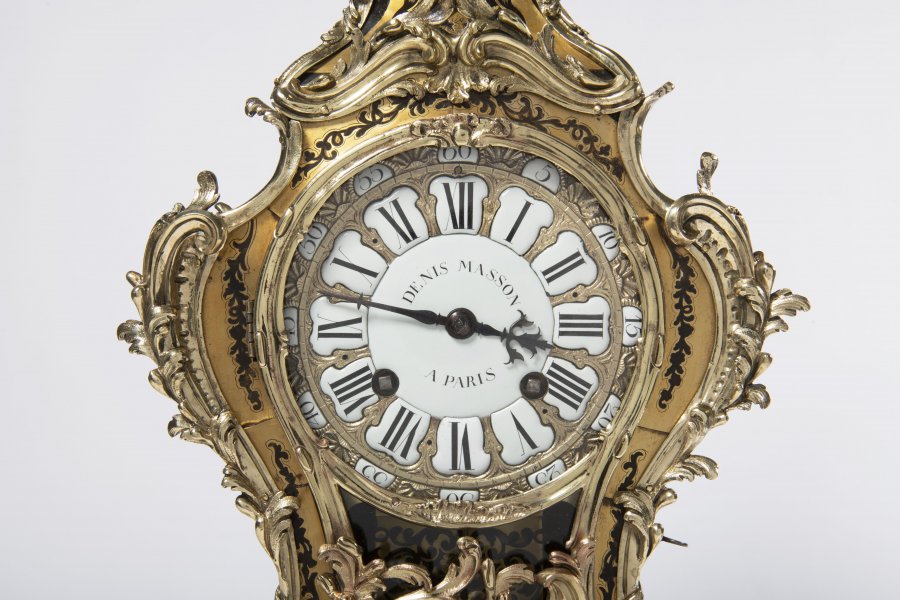 A LOUIS XV MANTEL CLOCK