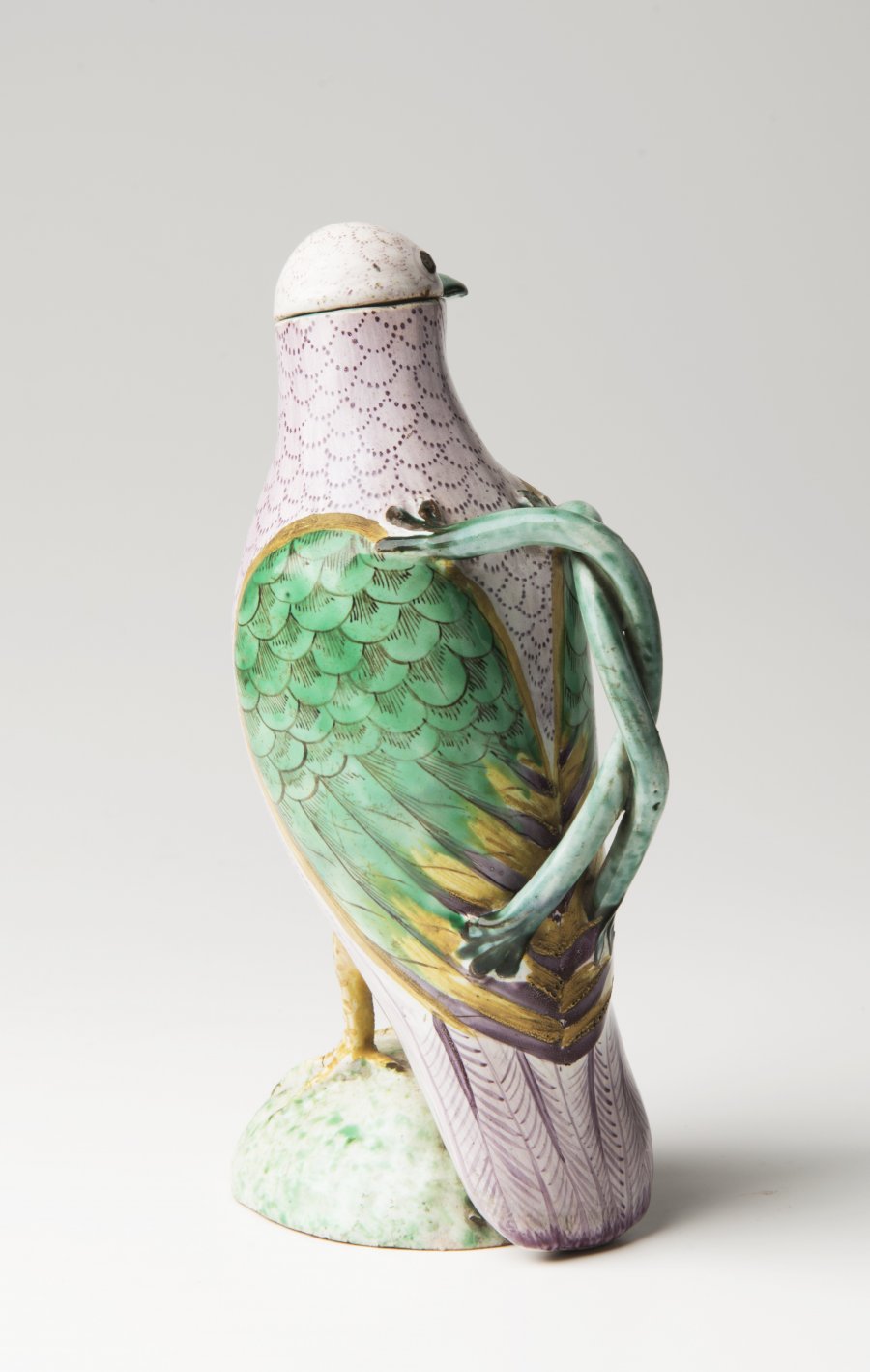 A PARROT-SHAPED JUG