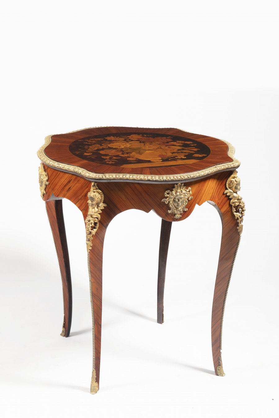 A RICHLY INLAID FRENCH TABLE