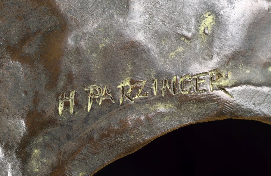 A BRONZE HEAD OF A YOUNG FAUN