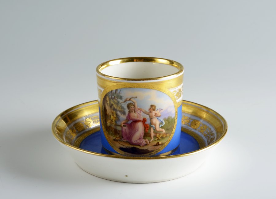 A CUP AND SAUCER