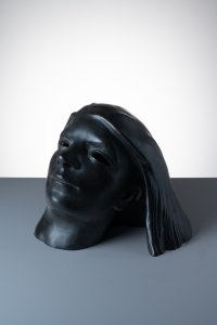 GIRL'S HEAD WITH FLYING HAIR
