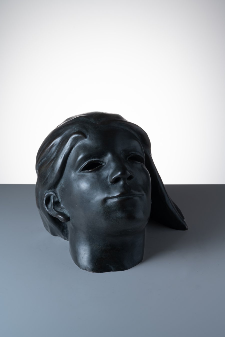 GIRL'S HEAD WITH FLYING HAIR