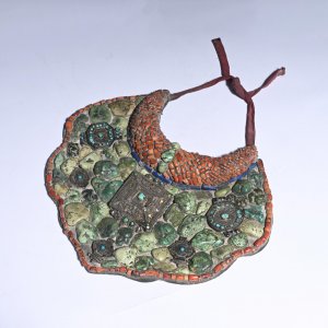 TIBETAN PECTORAL ORNAMENT WITH GEMSTONES AND CORAL